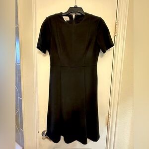 Donna Morgan Black Dress Size 4. Split hem and split sleeve detail.